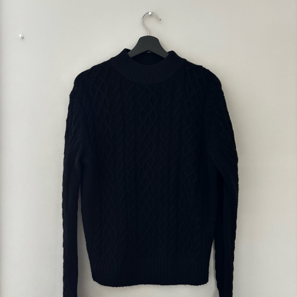 black cable knit sweater